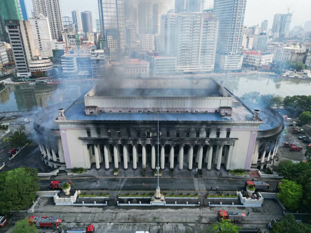 Manila Central Post Office after the 21st May 2023 fire - By Photos by K R De Asis, Charlene Santiago, and/or AJ Acosta for the Manila Public Information Office - Manila Public Information Office via CNN Philippines / Direct Facebook Link: May 22, 2023, Public Domain, https://commons.wikimedia.org/w/index.php?curid=132207059
